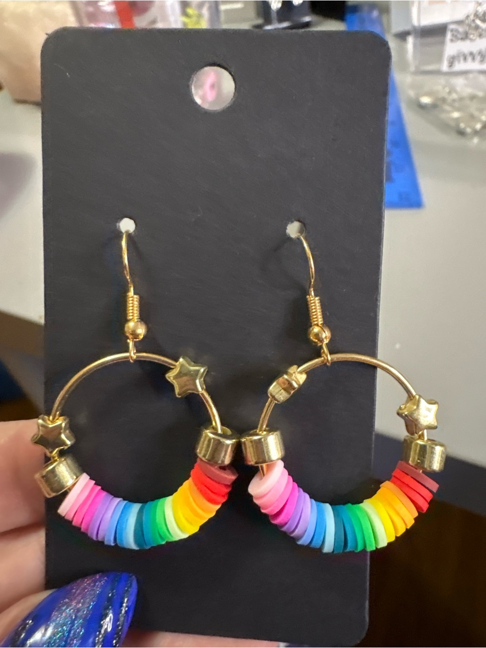 Gold Hoop Earrings with Rainbow Disk Beads and Star Accents - great for pride!